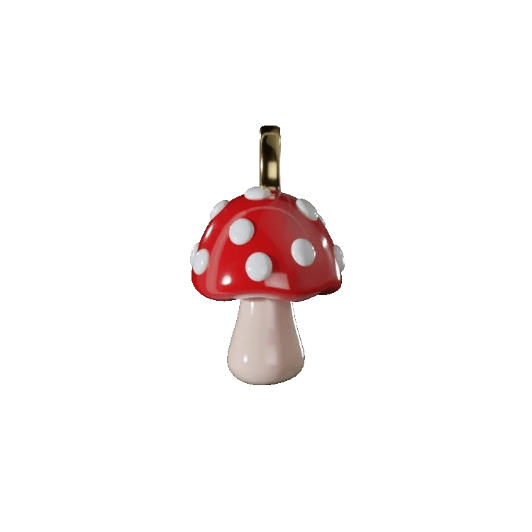 Mushroom-shaped pendant with red cap and white spots on a white background