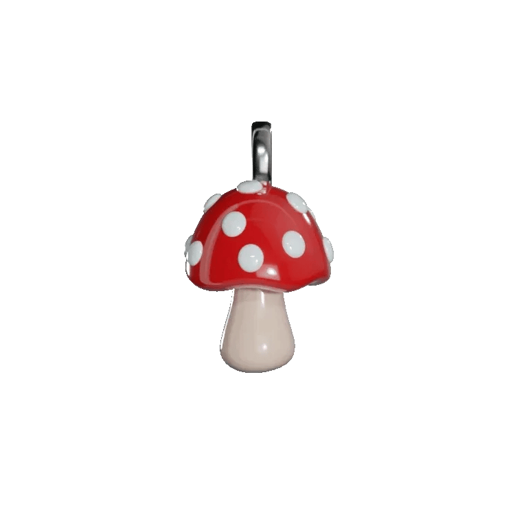 Mushroom-shaped pendant/charm with red cap and white spots